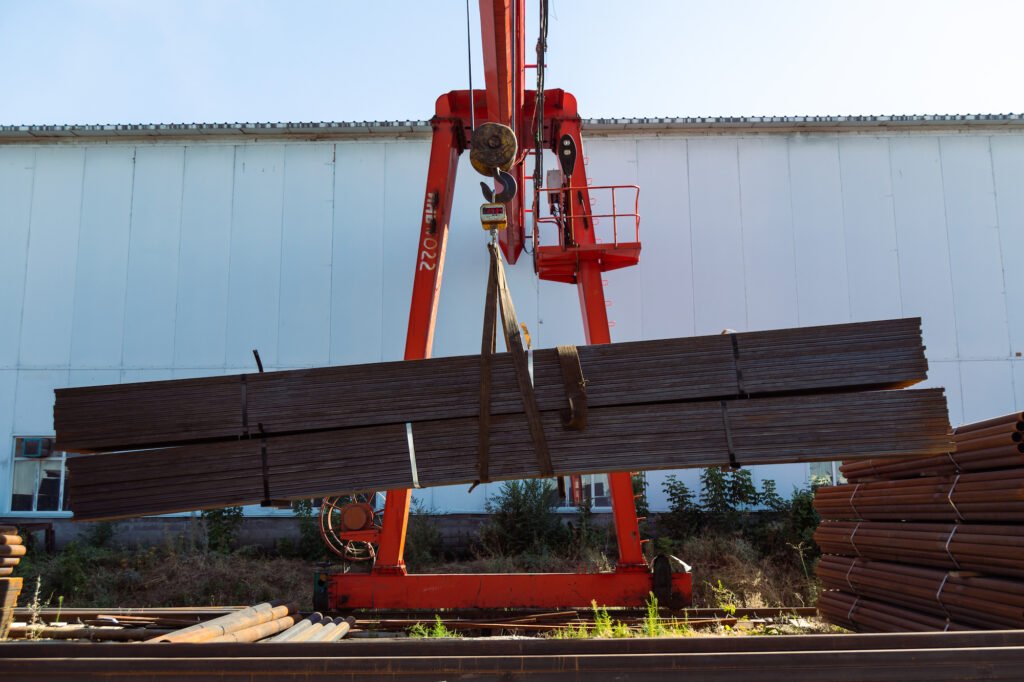 gantry crane transporting stack of metal pipes 2022 08 26 13 36 21 utc from Metreel